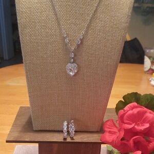 Silver Necklace with Teardrop Pendant and Sparkling Accents